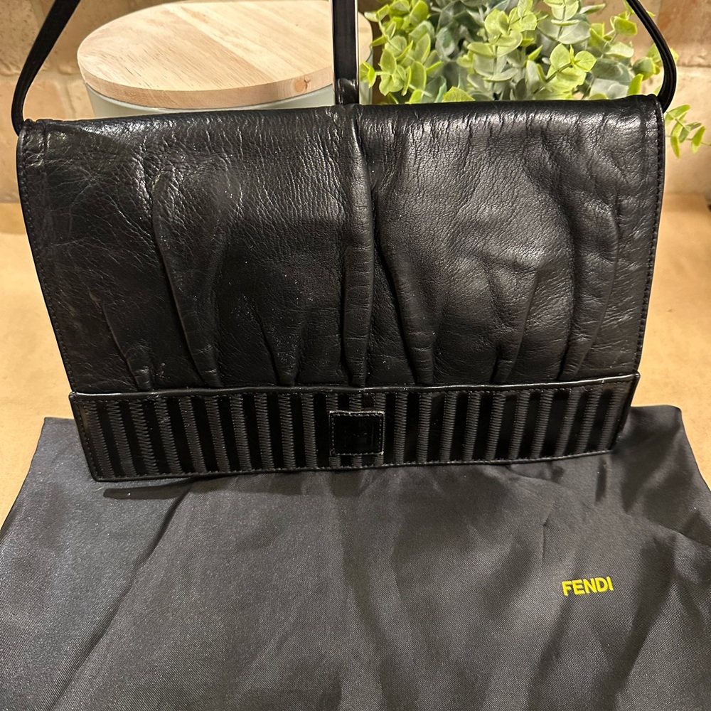 SoldFendi  Leather Bag w/ dustbag Strap is adjustable can be used as a clutch